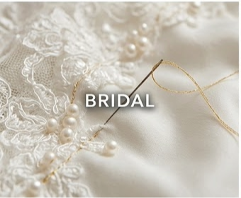 Bridal lace, pearls and hand-sewing needle