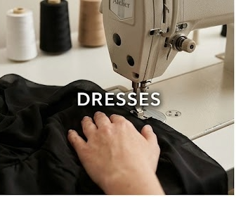 Black dress being altered at a sewing machine