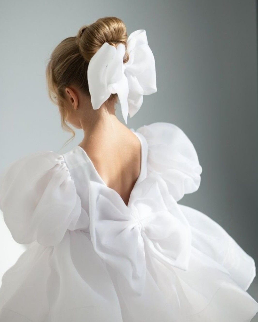 Dress alteration with organza bow detail by Koko Atelier, Galway
